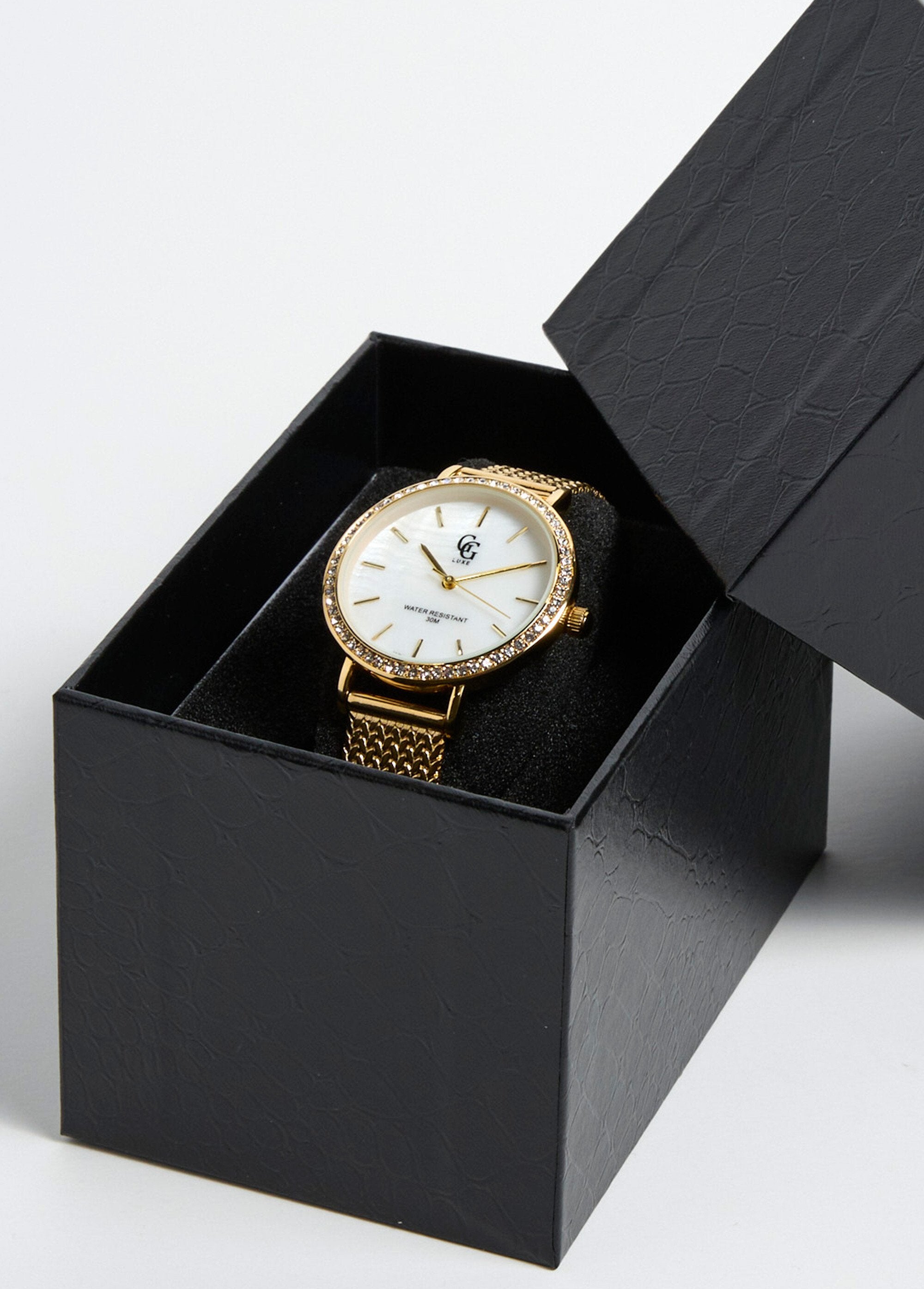 Reloj_redondo_de_acero_inoxidable_con_pedrería._Dorado_FA1_slim