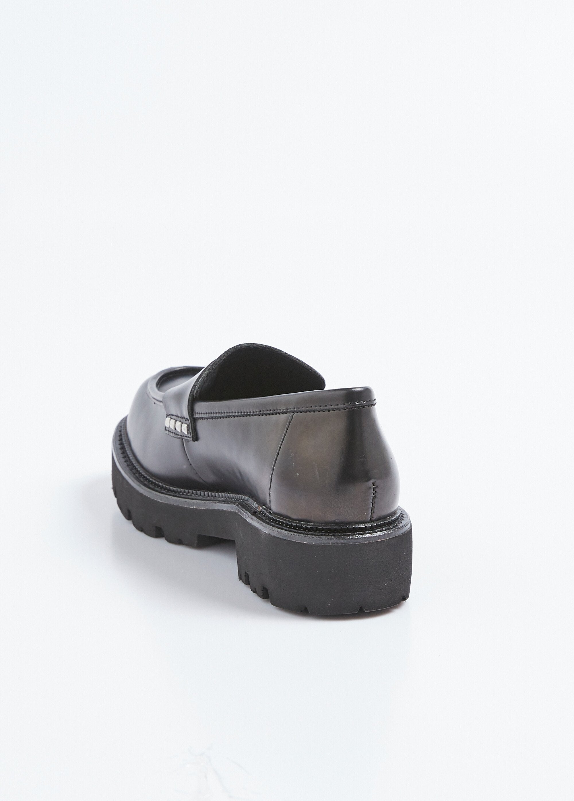 Mocasines_de_piel_con_suela_gruesa_y_dentada_Negro_DO1_slim