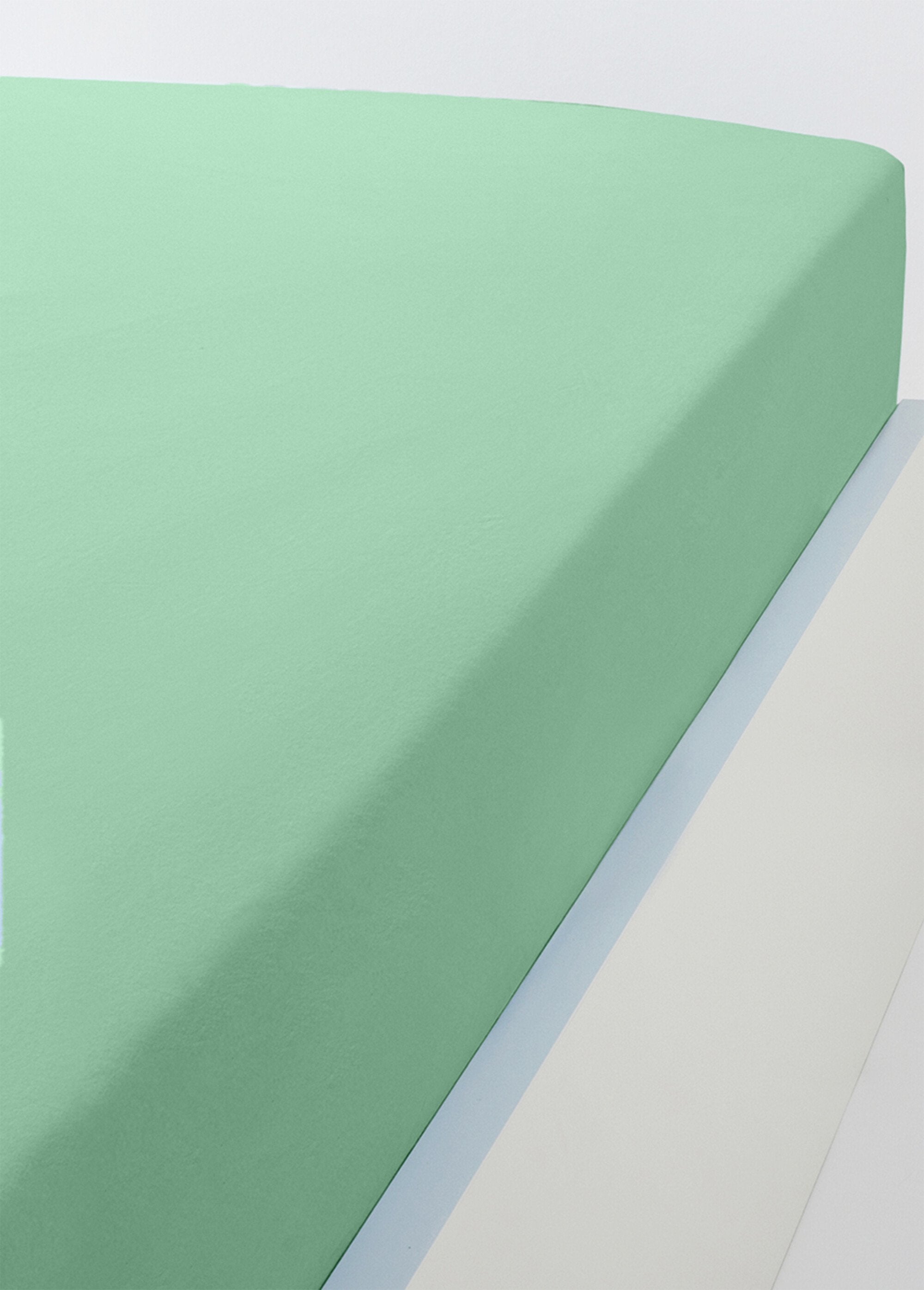 Sábana_bajera_de_punto_de_algodón_liso_Verde_FA1_slim