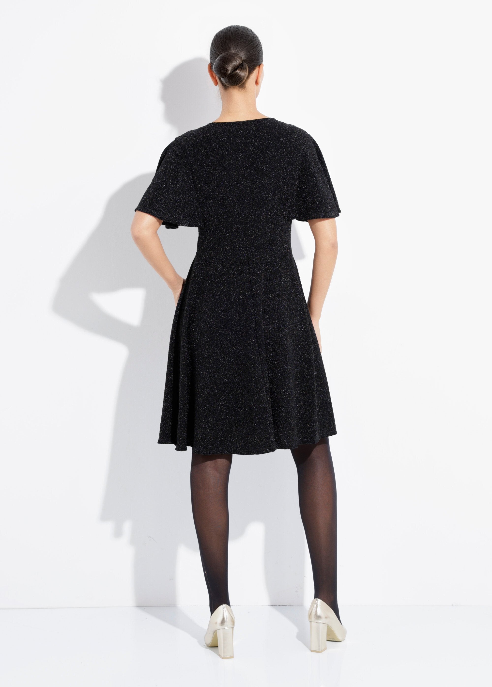 Vestido_acampanado_de_punto_metalizado_con_escote_en_V_Negro_DO1_slim